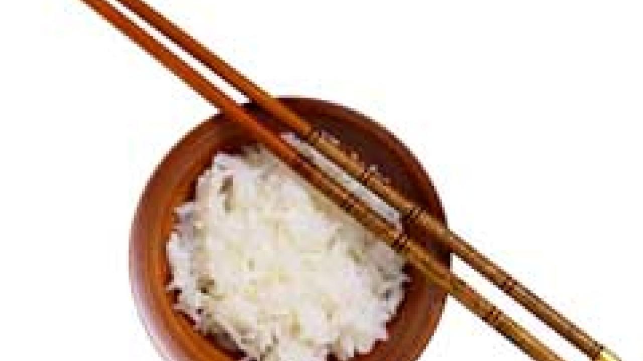 Photo: bowl of rice with chopsticks