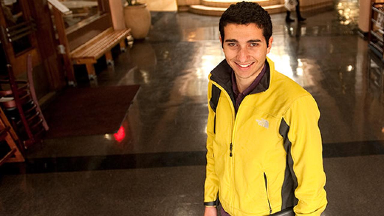 Man standing in a shopping center