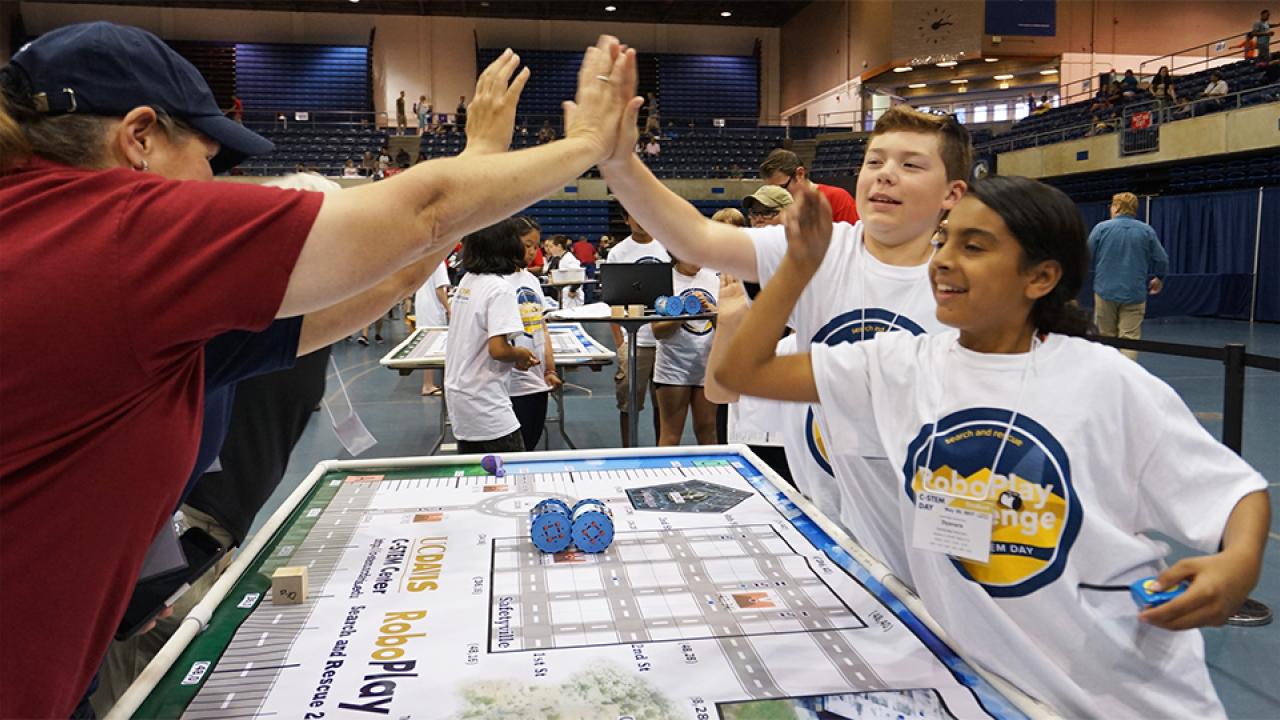 Students at robotics competition. 