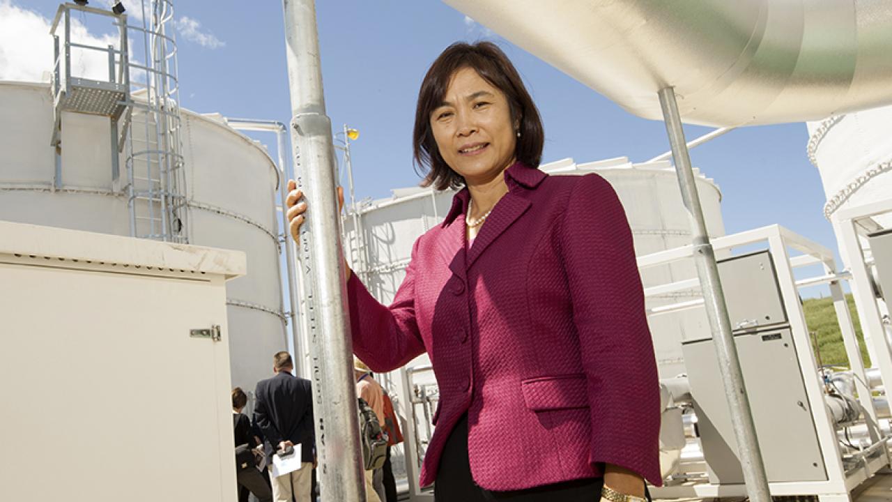 Photo: Professor Ruihong Zhang poses in front of READ apparatus,
