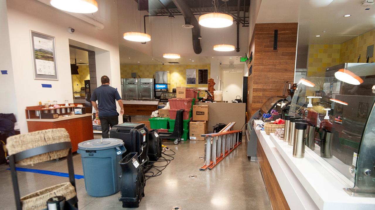 Cleaning equipment is spread out inside Scrubs Cafe.