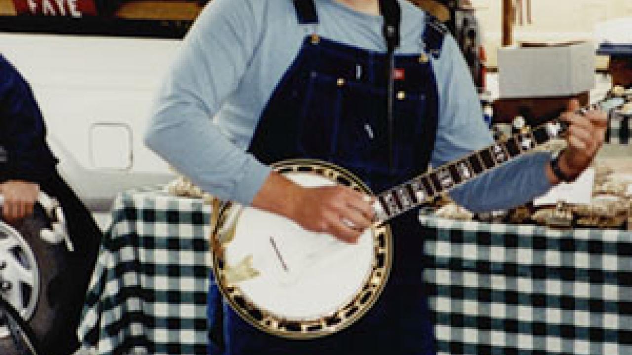 Blake Shester entertains audiences during one of his regular appearances at the Davis Farmers Market. (Ron Gottfredson/Courtesy photo)