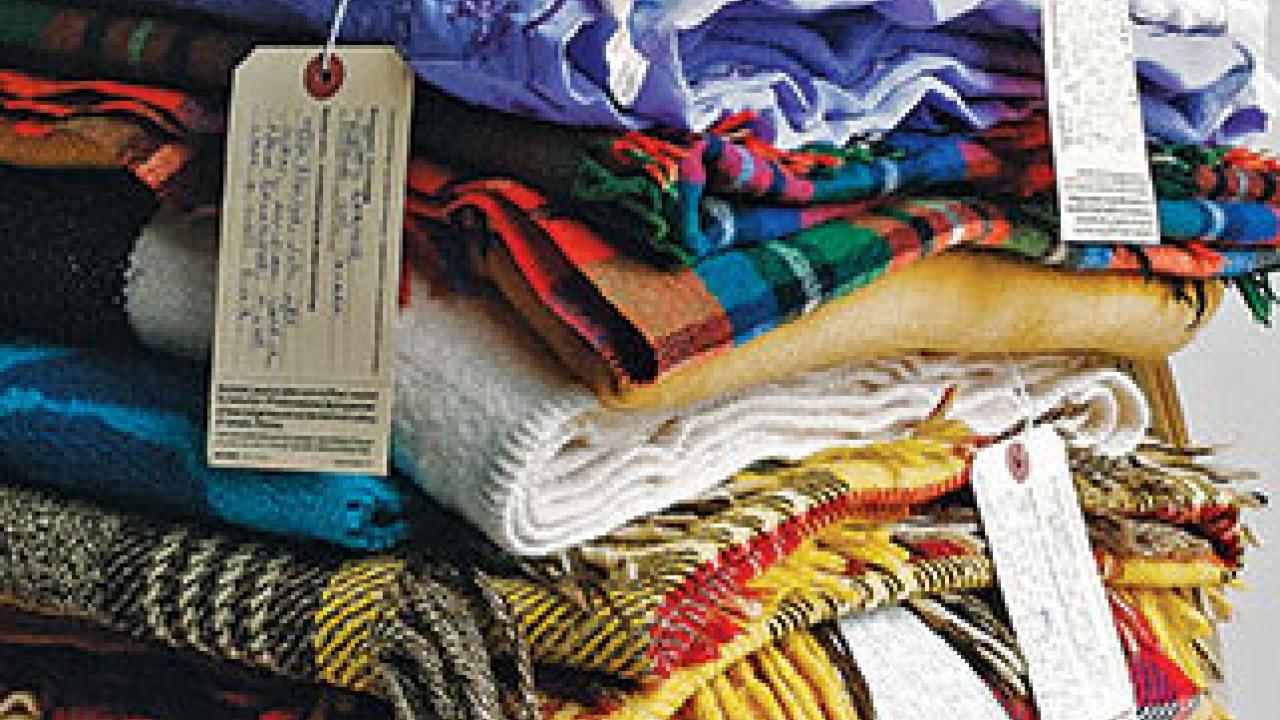 Photo: Detail of tower of blankets by Marie Watt