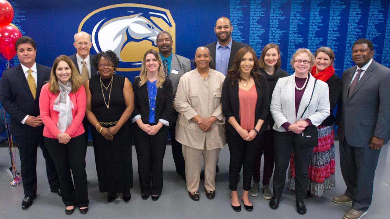 Soaoup photo, award recipients and presentersring to New Heights gr