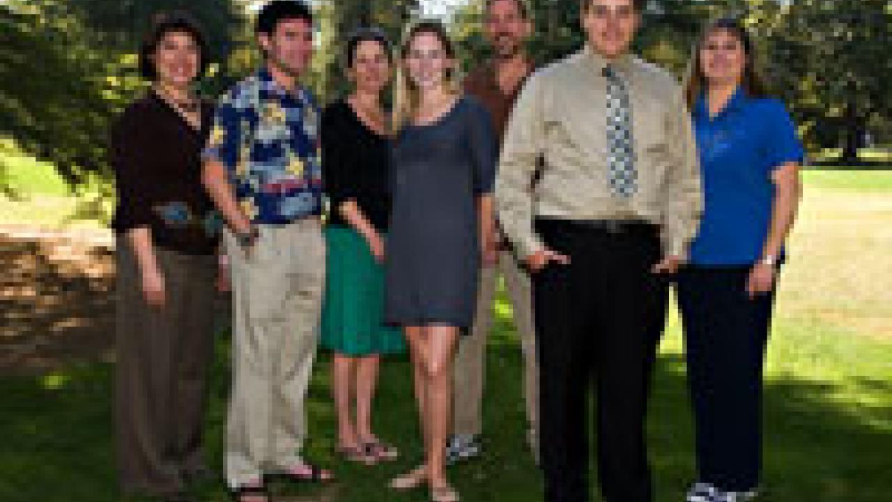 Scholarship recipients and proud parents: at left, UC Davis employee Laurie Greene (Department of Agricultural and Resource Economics) and her son, first-year student Jeff Buchoff; in the center, senior Melanie Ivie, flanked by her parents, Jean