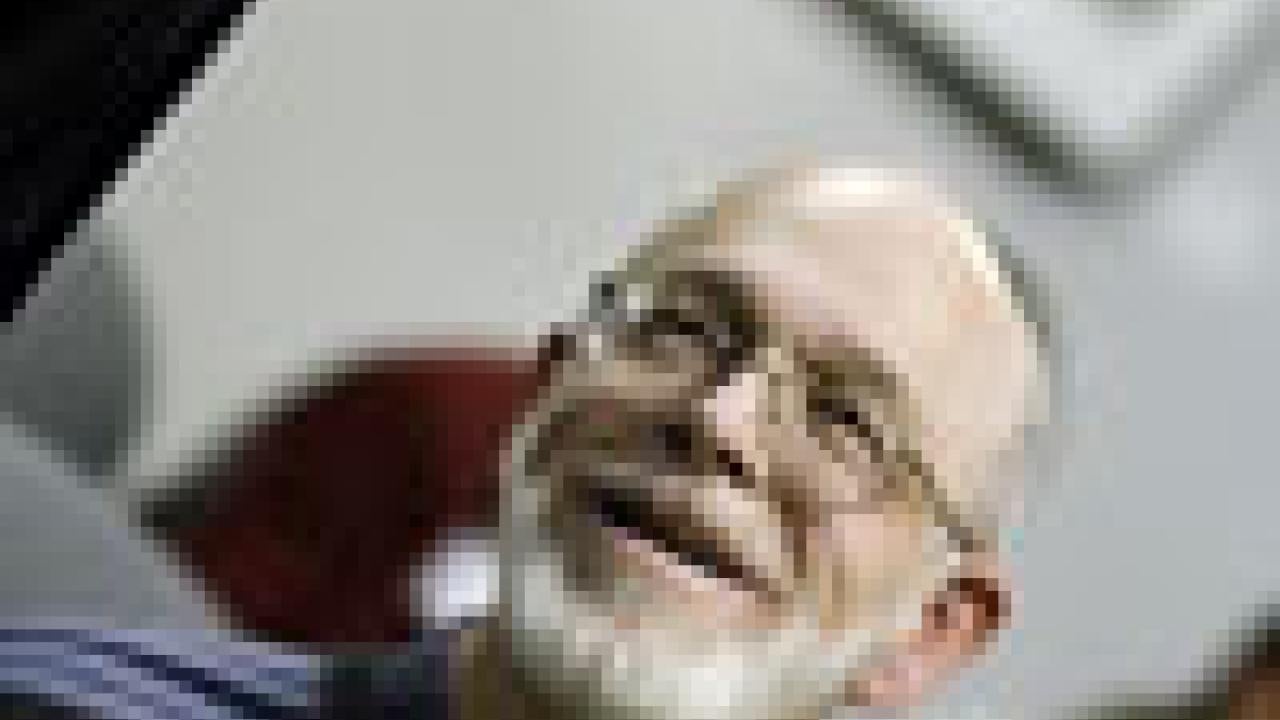 Plant biologist Terry Murphy asks Chancellor Larry Vanderhoef about W-2 tax filings involving campus employees.