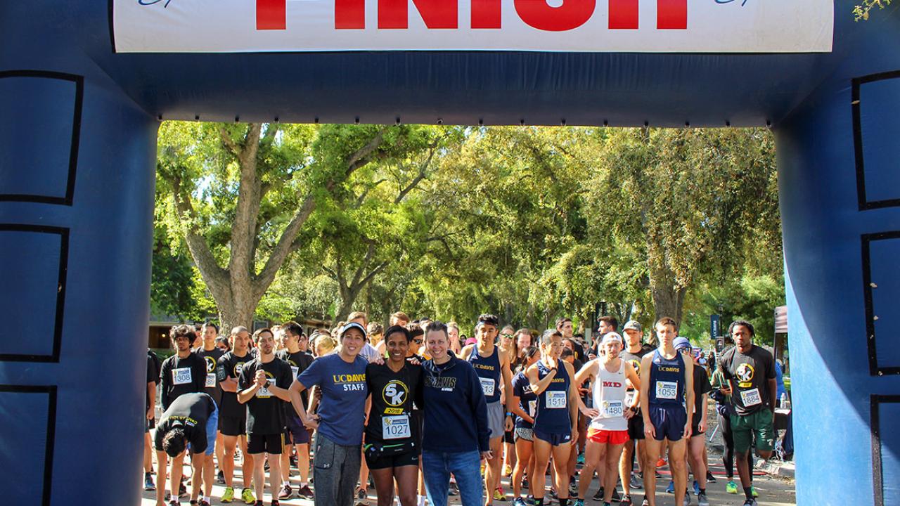 LeShelle May poses at the start of the Stride for Aggie Pride 5K race.
