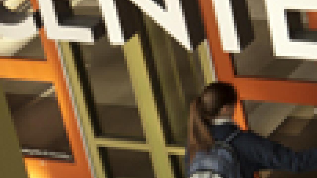 Photo: A students enters the new Student Community Center.