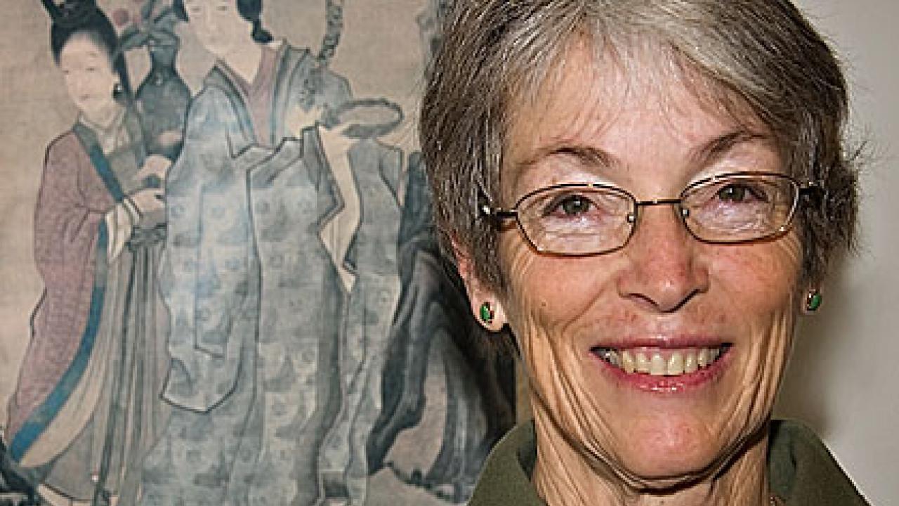 Photo: Susan Mann in front of a Chinese painting