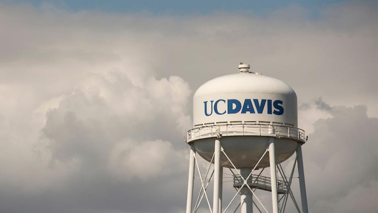 Water tower in clouds
