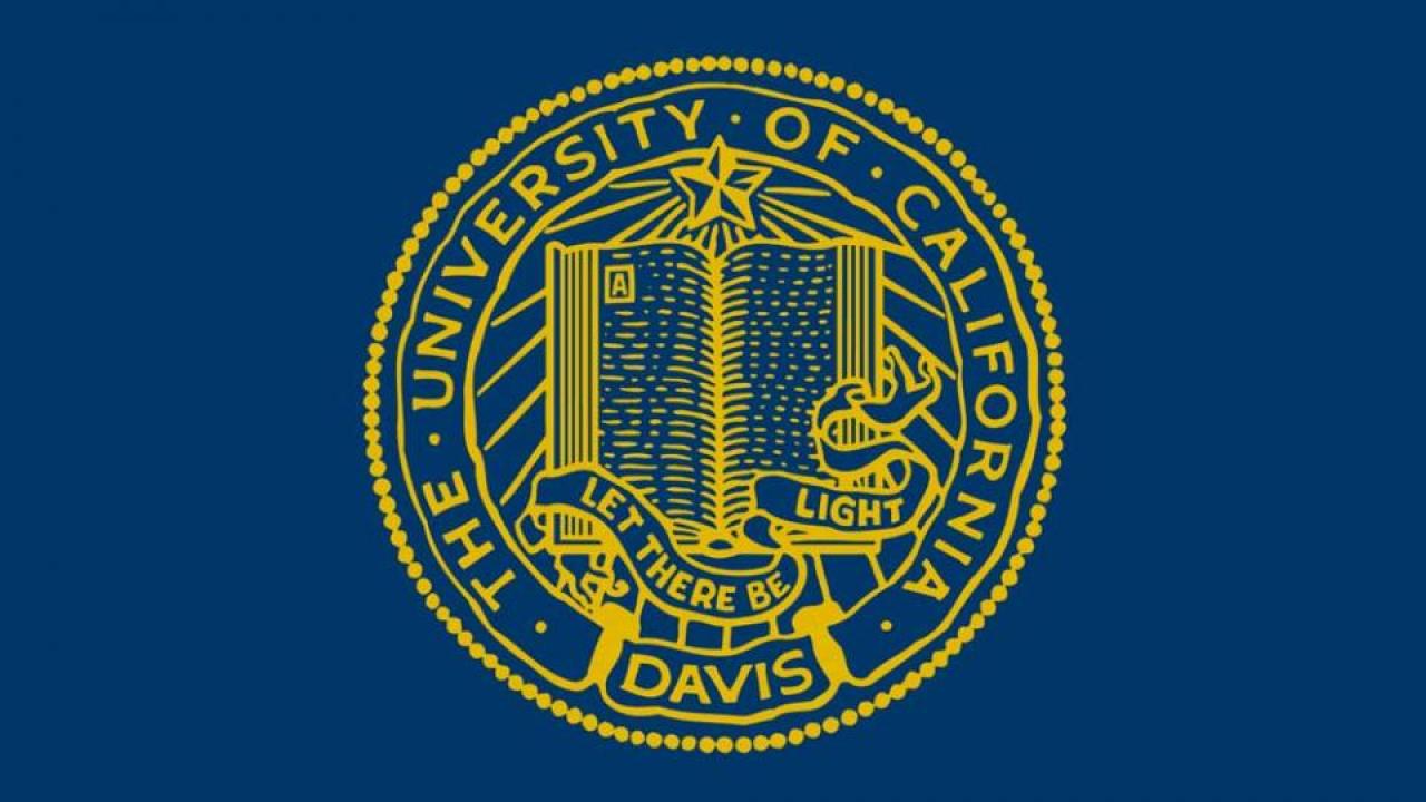 UC Davis seal, gold, on blue background