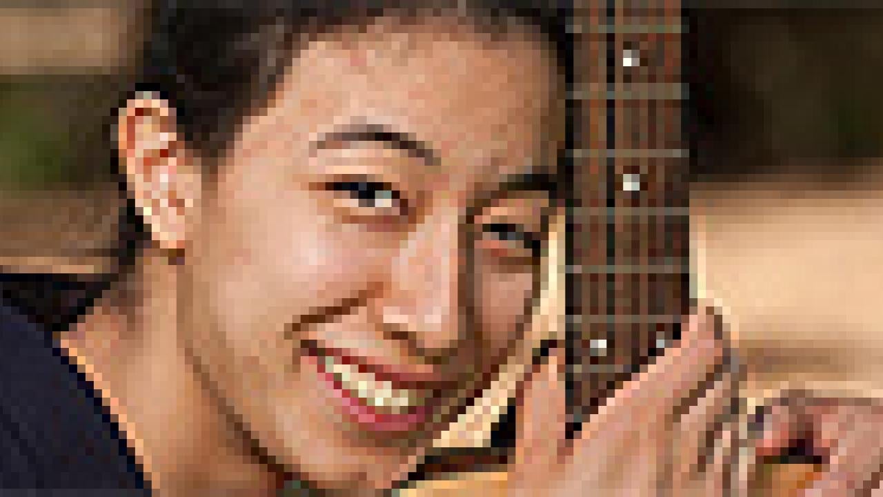 Lauren Keiko Salinero with guitar