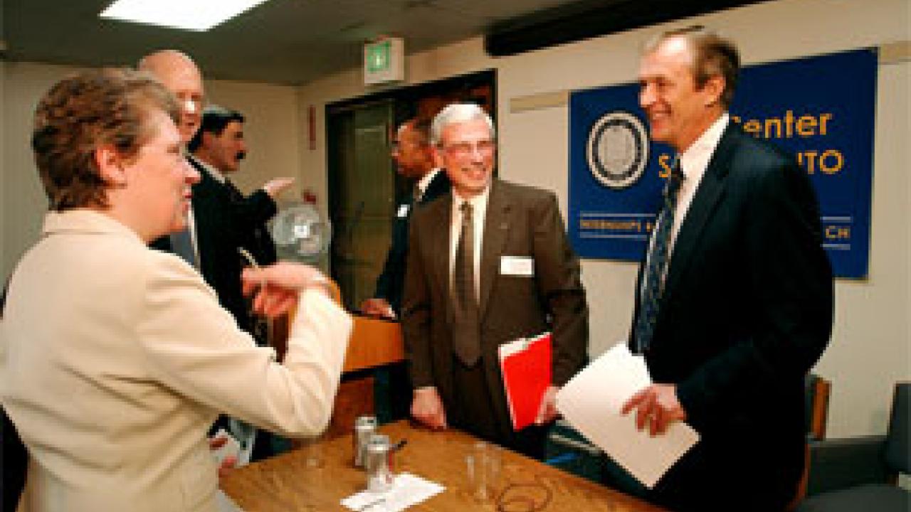 Claire Pomeroy, vice chancellor for Human Health Services, talks with UC President Robert Dynes during a program highlighting UC&rsquo;s efforts to use &ldquo;doctors in training&rdquo; to address the needs of underserved populations in the state. The progr