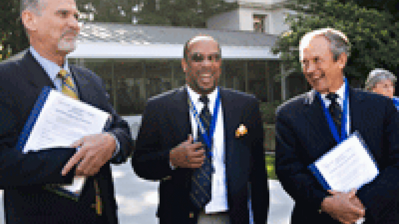 Left to right: Rory Hume, UC provost, Michael Brown, UC Academic Senate chair, and Bob Dynes, UC president, gather near the north steps of the state Capitol for UC Day 2008 on March 4 during a break in their meetings with lawmakers. 