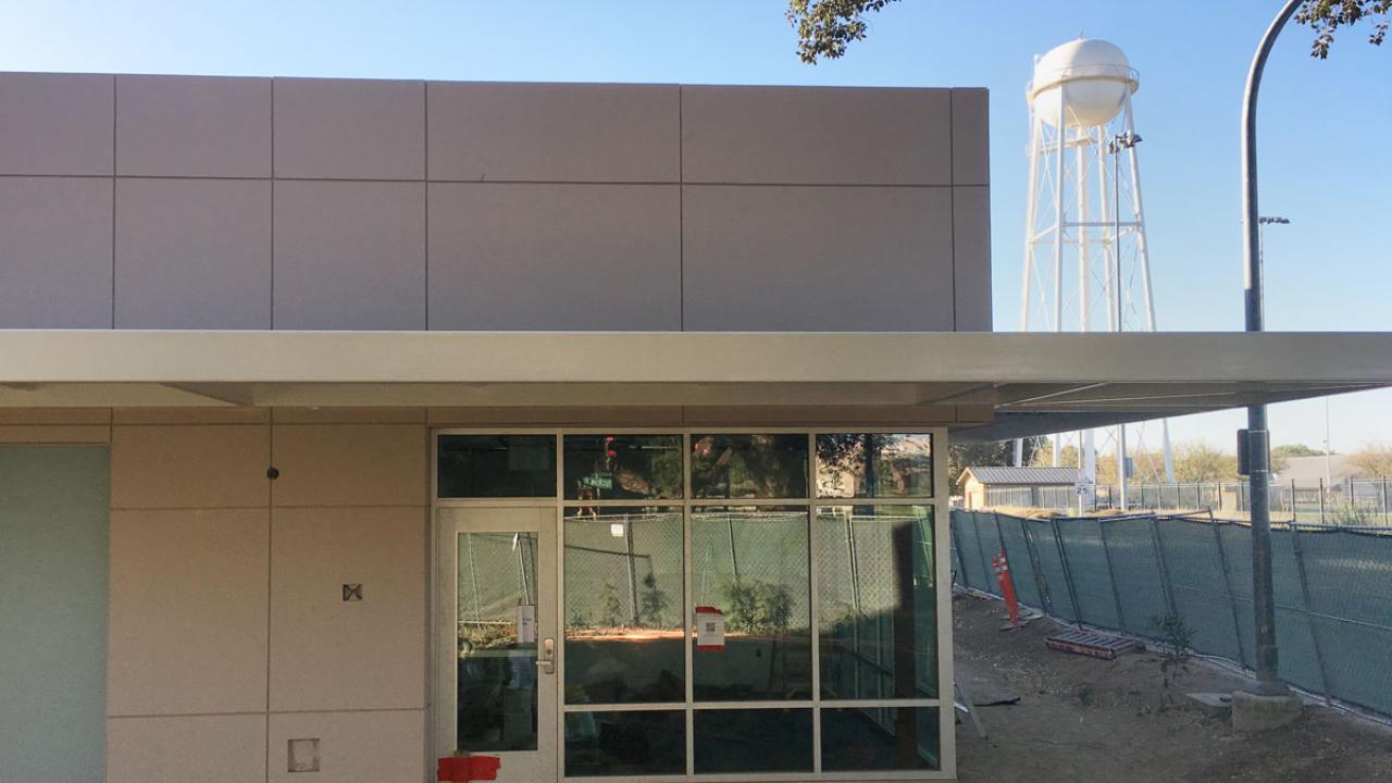 Clinic building, corner, with glass