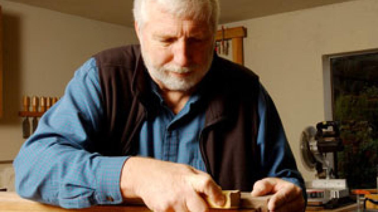 Neal Van Alfen works on a carpentry project in his Davis workshop/garage.  