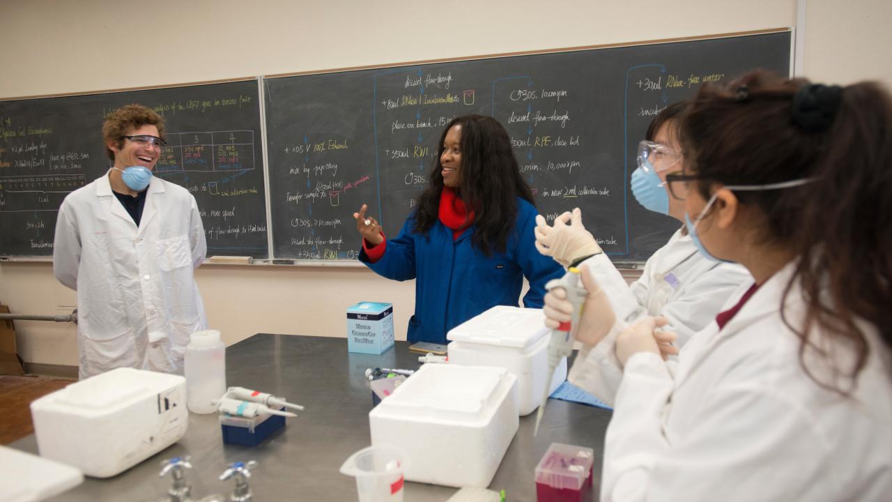 Professor talking with student