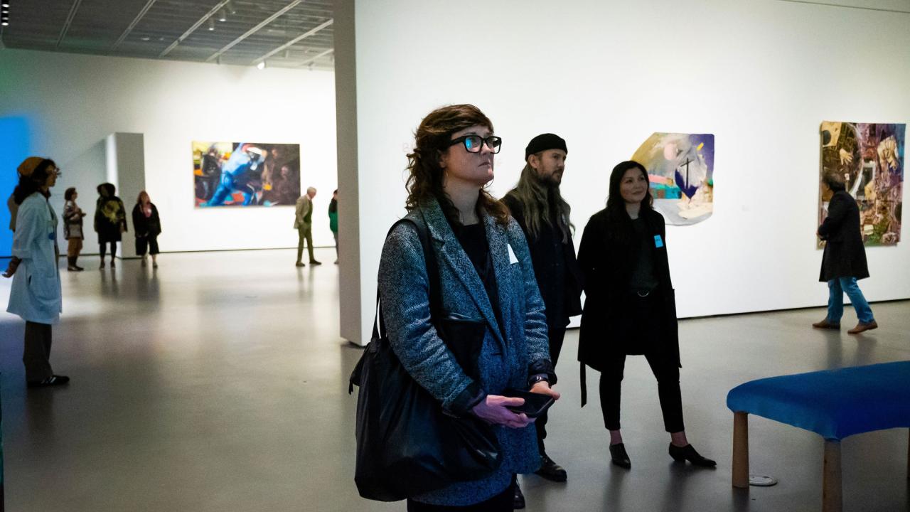 Manetti Shrem Museum visitors eye Henderson exhibit.