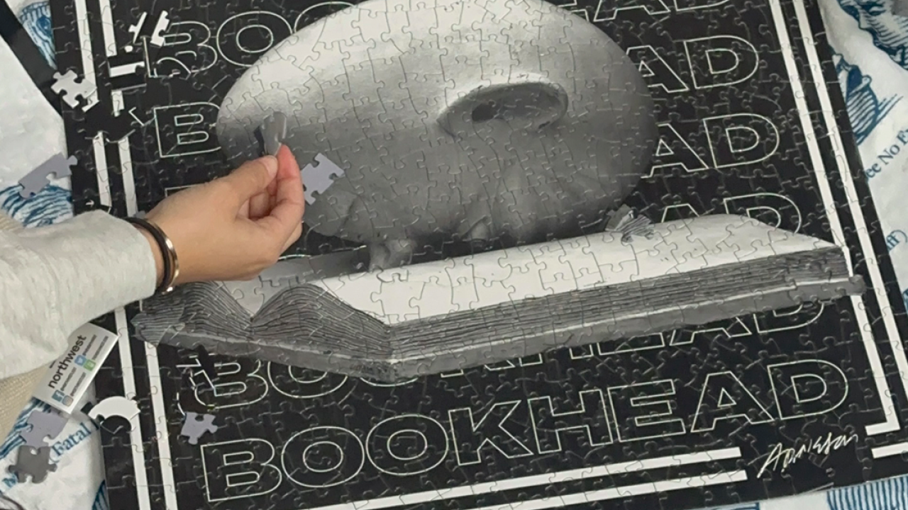 Black and white Jigsaw puzzle depicting Bookhead from the Arneson Eggheads Collection