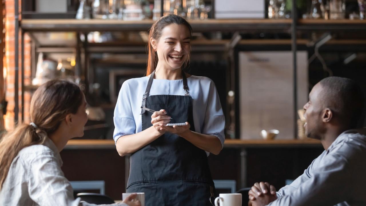 Waitress taking an order at restaurant