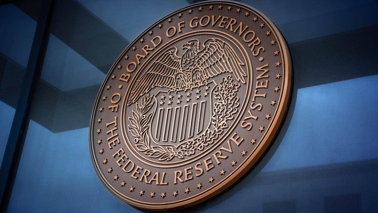 Emblem of Federal Reserve bank in metallic color