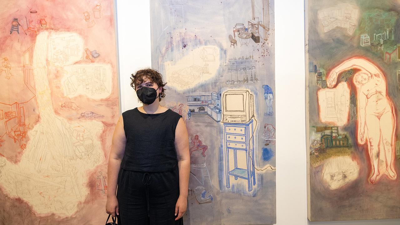 Gracianne Kirsch, a UC Davis Art Studio M.F.A. alum, with their work at the Arts & Humanities 2024 Graduate Exhibition held in the Jan Shrem and Maria Manetti Shrem Museum of Art. Kirsch won the inaugural Letters & Science Prize for Excellence. (Hung Q. Pham Photography)