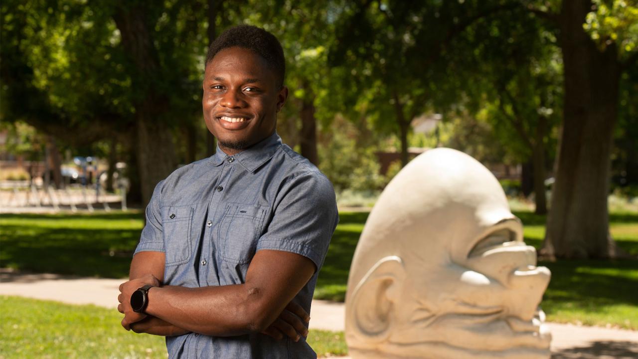 Chiduben Victor Nnaji poses in front of an Egghead 