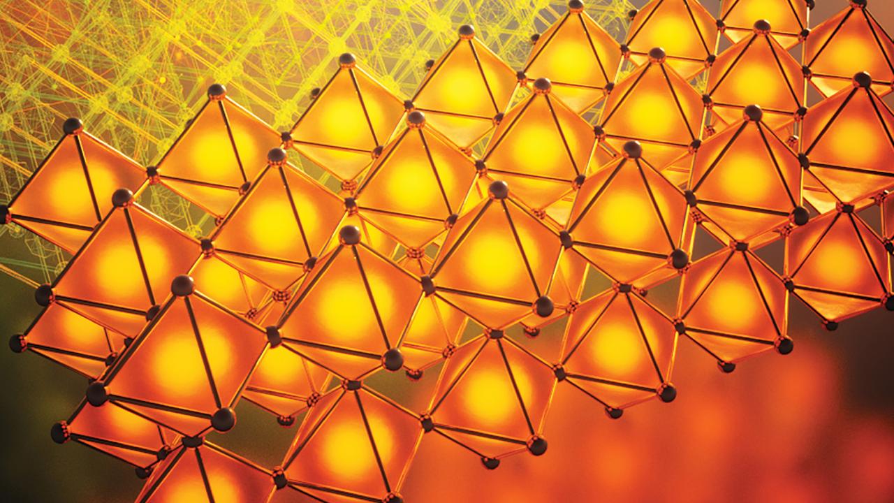 Rows of bright orange tetrahedral shapes against a red/yellow background. 