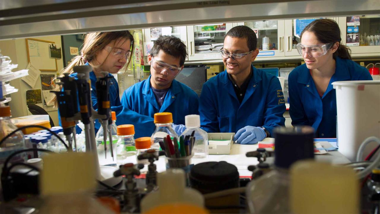 Aldrin Gomes is shown in lab with students