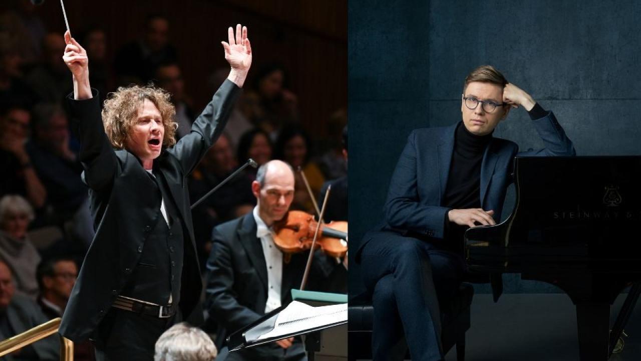 Orchestra on darkened stage