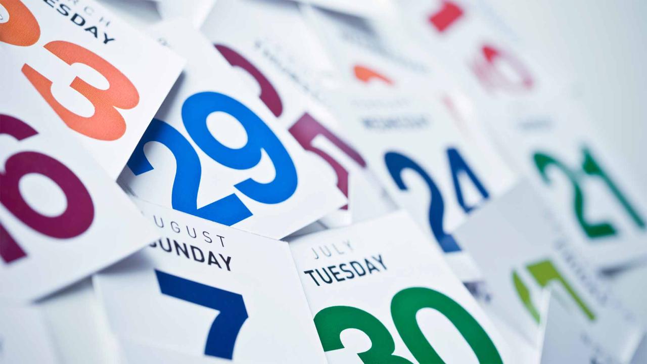 Photo shows calendar pages of many different dates