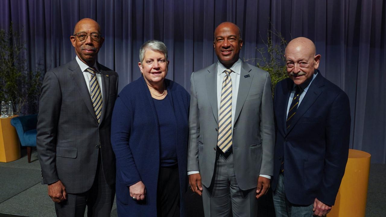 3 UC presidents and a chancellor, posing, in a line
