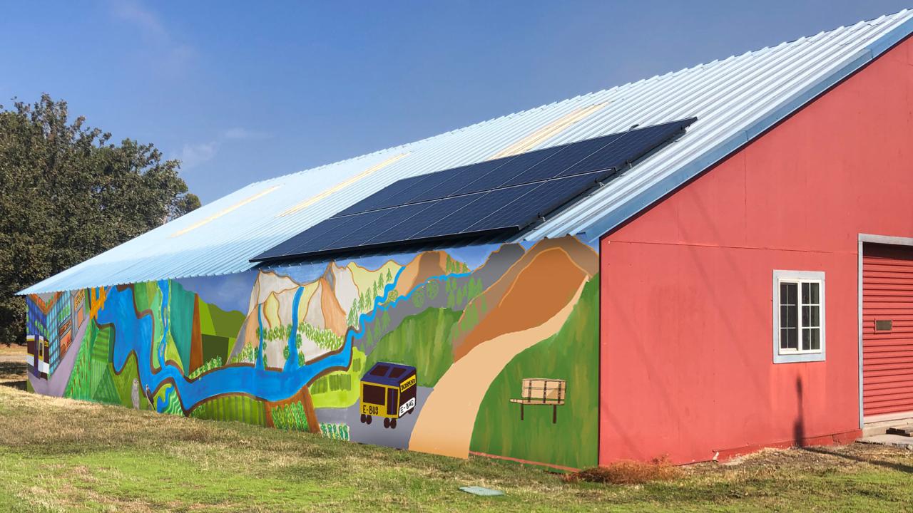 Photo illustration: Climate mural on side of barn