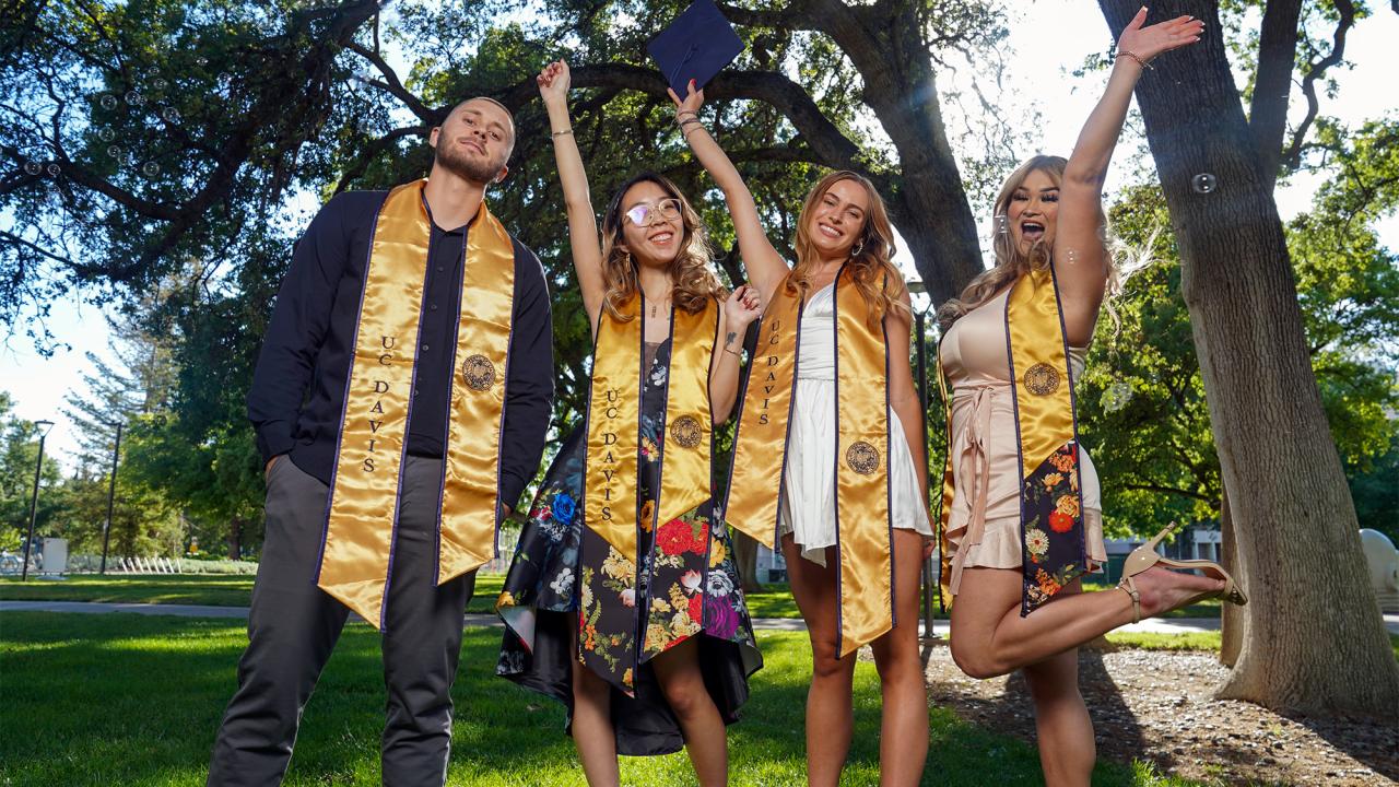 Gradutes cheer and celebrate