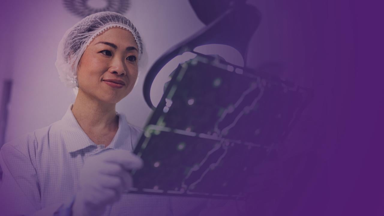 A person looking at some x-rays in a lab