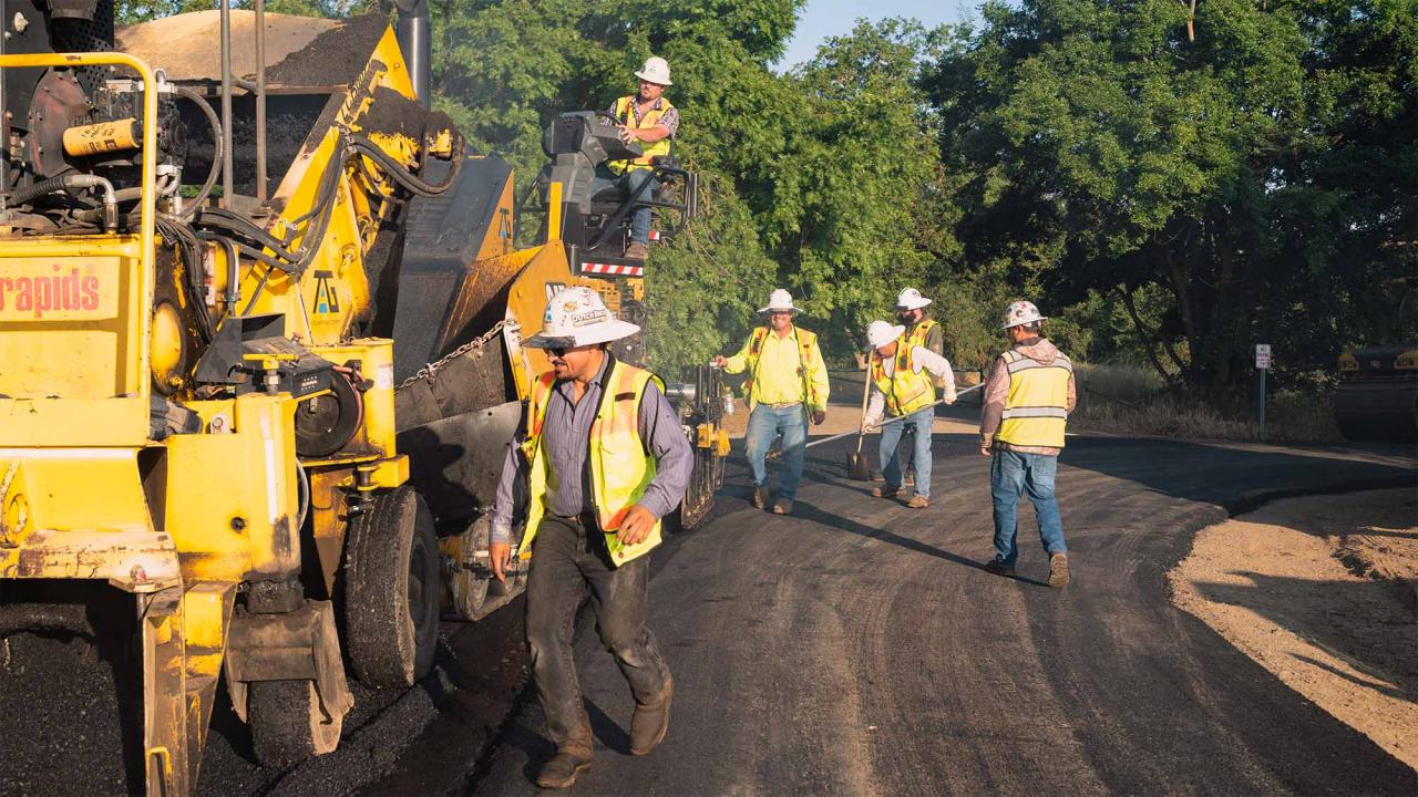 Road crew at work repaving road