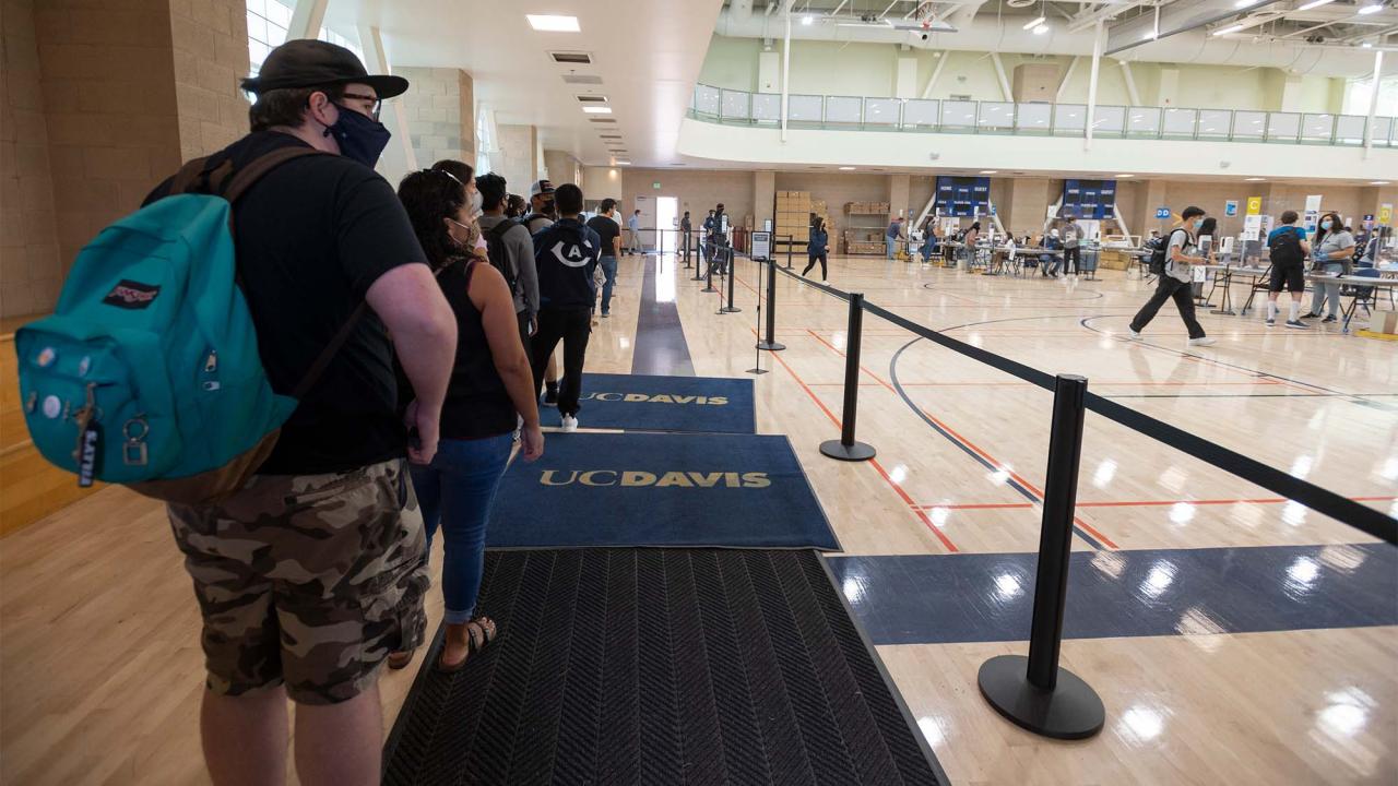 Students wait in line inside the ARC to get COVID-19 tests.