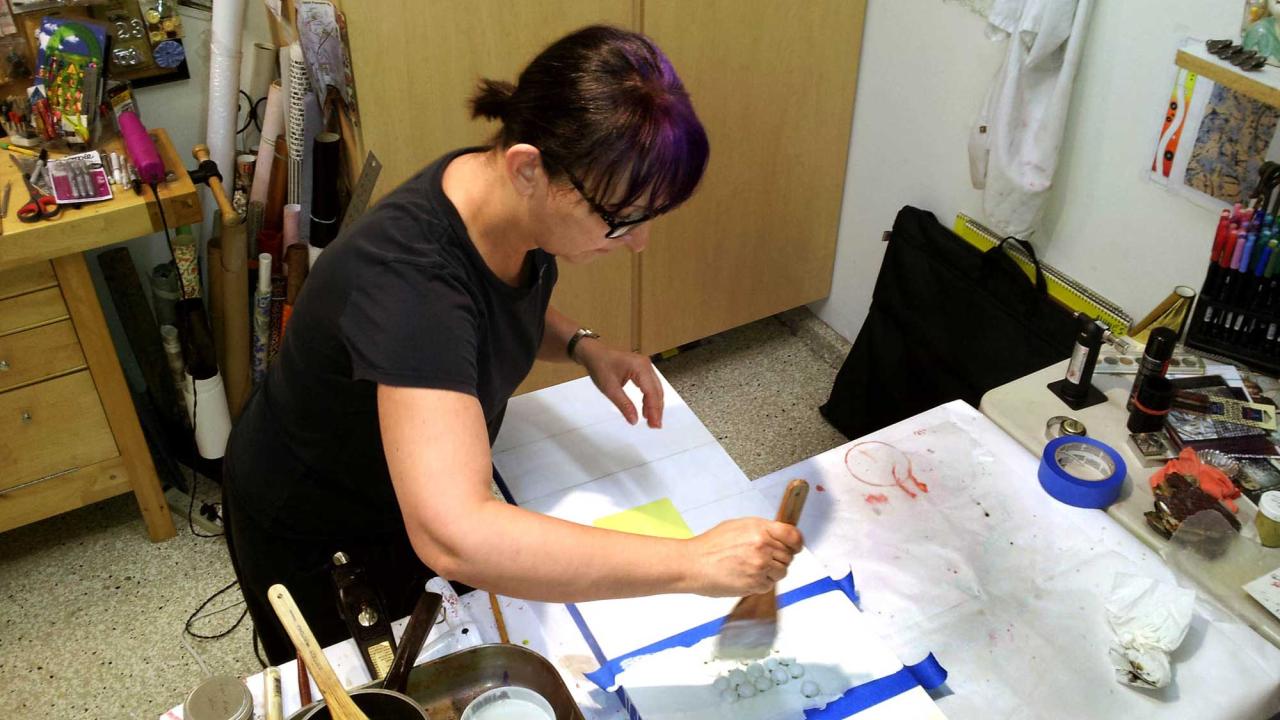 Studio picture of artist working.