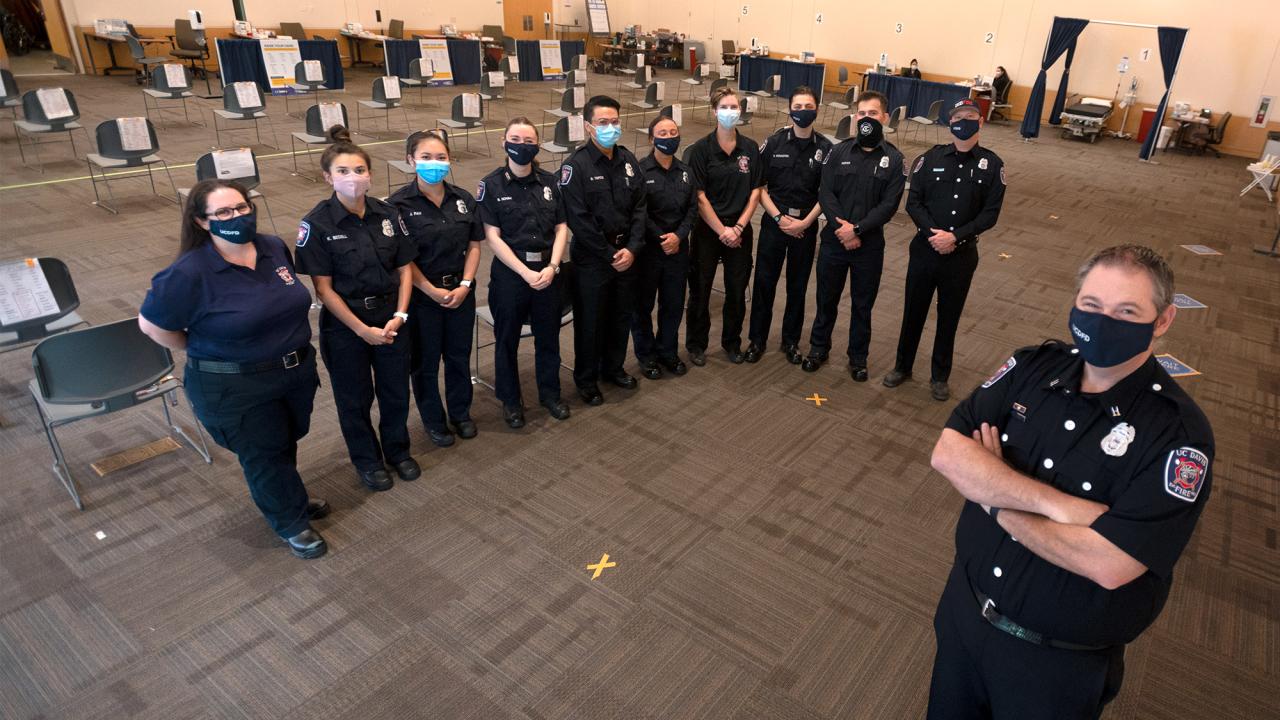 Fire Department staff pose for photo with Capt. Scott Hatcher