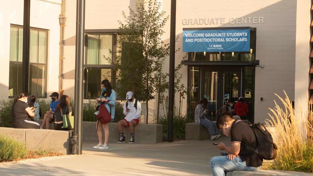 Students in front of entrance to the Graduate Center at Walker hall