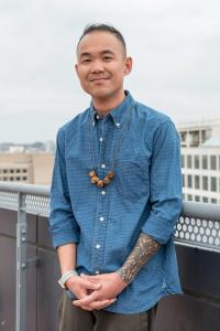 Man with blue shirt on, Adriel Lewis