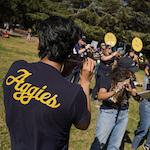 Students Playing Instruments On Field