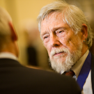 Gary Snyder, with blue ribbon (holding UC Davis medal) around his neck.