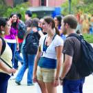 Students gather outside the Memorial Union building on the first day of classes last fall.