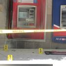 Photos: The Bank of America ATM, showing fire damage; and the bottom half of a broken bottle, about 75 feet away.