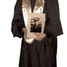 Arlene Ikemoto Lawrence, representing her uncle, Gus Ikemoto, at the December commencement.