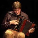 Danu's Benny McCarthy plays the button accordian.