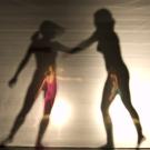 UC Davis students Anne Reeder and Jenna Chen perform in John Jasperse's Beyond Belief, a new work that alternates between constructing and deconstruct