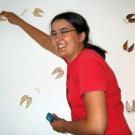 Catherine Yasuda installs hand-shaped mule deer footprints for her exhibition, Odocoileus hemionus (mule deer), at the Craft Center Gallery.