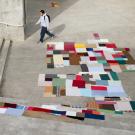 Pieces of cloth in a colorful, quiltlike arrangement comprise Farmscape Death Star in the courtyard of the Humanities and Social Sciences Building.
